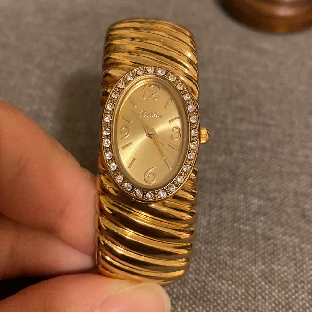 gold watch with gems around face - Picture 4 of 6